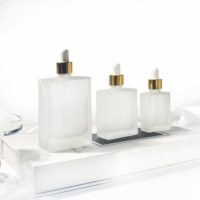 Flacons d'huile essentielle rectangulaires de luxe, flacon d'huile corporelle 30ml 50ml 100ml, flacon compte-gouttes en verre, flacon de crème pour les yeux, emballage cosmétique