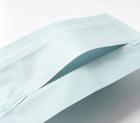 Sac imprimé OEM ODM en forme d'os, emballage Mylar à fermeture éclair scellé sur trois côtés pour friandises lyophilisées pour animaux de compagnie
