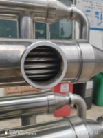 Stérilisateur/Pasteurisateur tubulaire UHT en acier inoxydable 304/316L, 121°C, qualité alimentaire, résistant à la corrosion, conforme HACCP pour lait et jus