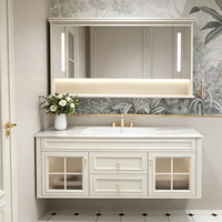 Ensemble de meubles de salle de bain de style français de luxe, armoire flottante blanche crème avec porte en verre cintrée et miroir LED intelligent, OEM ODM