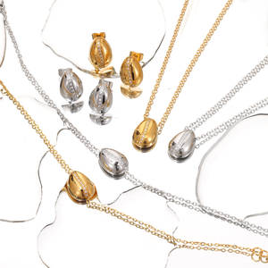 Conjunto de Joyería de Moda Estilo Europeo y Americano con Collar, Pulsera y Aretes, Accesorios Versátiles de Acero Inoxidable a Prueba de Agua - Product Image 2