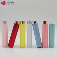 Atomiseur de parfum de voyage de luxe cylindrique rond rechargeable 8ml 10ml 15ml – Flacon pulvérisateur cosmétique oral à mécanisme rotatif