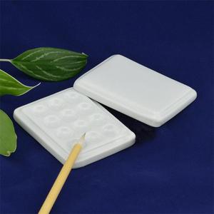 <span class=keywords><strong>Palette</strong></span> de <span class=keywords><strong>peinture</strong></span> en <span class=keywords><strong>porcelaine</strong></span> de forme carrée de 12 puits avec la <span class=keywords><strong>palette</strong></span> de <span class=keywords><strong>peinture</strong></span> en céramique blanche lavable de couverture pour le mélange de <span class=keywords><strong>peinture</strong></span> utilisant - Product Image 5