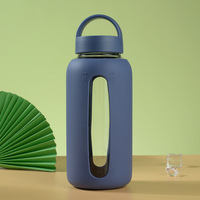 Gobelet à eau en verre borosilicate de haute qualité avec manchon en silicone, résistant à l'usure, antidérapant, design portable pour les sports de plein air, sans BPA