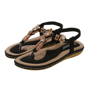 Sandales plates pour femmes à bout ouvert en faux daim avec décoration florale, semelle extérieure en caoutchouc respirant, tendance mode estivale, vente en gros - Product Image 1