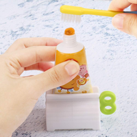 Porte-distributeur de dentifrice animal Tube roulant en plastique Pressoir Extrudeur de dentifrice Accessoires de salle de bain à domicile Fournitures