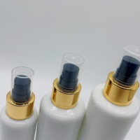 Flacon de lotion en verre de haute qualité pour cosmétiques, 50 ml, 100 ml, 120 ml, flacon rond en verre blanc avec pompe à lotion dorée