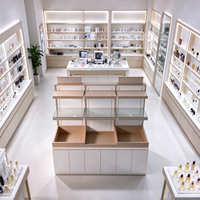Étagère à cosmétiques en bois clair blanc, trois niveaux ouverts, dessus en verre, armoire inférieure, CE ETL, pour salon de beauté