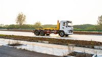 Camion à bras de ramassage Shacman 6x4 en promotion avec station de compactage des déchets, solution de système de transfert