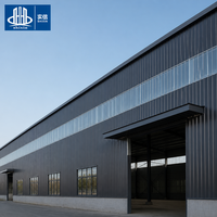 Entrepôt préfabriqué en acier avec panneaux en acier de couleur personnalisée, fabricant de bâtiments d'usine et d'ateliers à structure portique à Chongqing