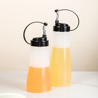 Botellas exprimibles con tapa negra, paquete de 2, contenedor de condimentos recargable a prueba de fugas para uso en la cocina