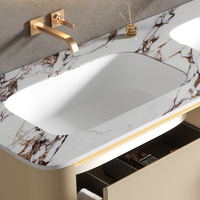 Meuble-lavabo de salle de bain de luxe de style européen avec rangement, double vasque et plateau en marbre, pour salle d'eau.