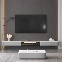 Ensemble table basse et meuble TV flottant moderne de luxe, écologique et durable, avec plateau en pierre frittée et console multimédia murale en contreplaqué