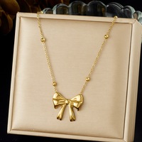 Collier pendentif cœur nœud papillon plaqué or 18 carats, chaîne à perles en acier inoxydable 316L pour femme, vente en gros personnalisée
