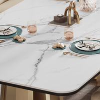 Ensemble de table à manger rectangulaire au design de luxe table de salle à manger moderne avec pieds en acier inoxydable 6 8 10 places et dessus en marbre avec pierre frittée
