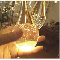 Lustre en cristal rotatif de luxe pour l'installation de suspension d'escalier de villa