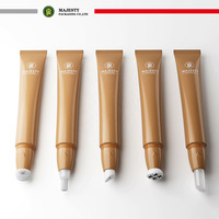 Tube cosmétique en plastique PE avec tête de massage en acier inoxydable et applicateur à brosse pour gloss et lotion