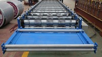 Machine de formage de panneaux de toiture en métal de haute qualité et à grande vitesse pour matériaux de construction