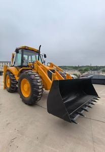 Chargeuse sur pneus JCB 4CX jaune avec pelle et bras hydraulique pour travaux de construction - Product Image 3