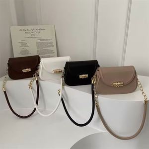 Nuevo bolso de mano de verano impermeable de cuero genuino para mujer, estilo simple y moderno, bolso cuadrado pequeño con correa para el hombro. - Product Image 1