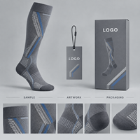 Chaussettes de compression sportives gris anthracite à compression graduée pour mollets, avec tableau de mesure, manchette plus large et bout plat