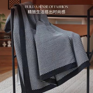 Venta al por mayor nórdico simple viento de punto diseño de onda nueva línea de manta de punto