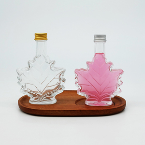 Bouteille en verre transparente en forme de feuille <span class=keywords><strong>d</strong></span>'<span class=keywords><strong>érable</strong></span> avec couvercle pour <span class=keywords><strong>whisky</strong></span> et <span class=keywords><strong>sirop</strong></span> <span class=keywords><strong>d</strong></span>'<span class=keywords><strong>érable</strong></span> – Emballage de stockage en gros - Product Image 3
