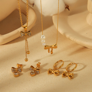 Ensemble collier et boucles d'oreilles nœud papillon doré, plaqué or 18 carats, pendentif perle, bijoux de fête, accessoires de mode pour femmes - Product Image 1
