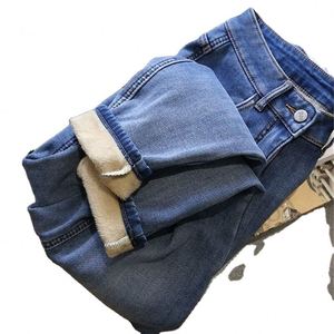 <span class=keywords><strong>Jeans</strong></span> da Donna Invernali in Caldo e Spesso Pile Modello <span class=keywords><strong>Mom</strong></span> Pants Larghi a Vita Alta, Pantaloni Casual da Streetwear in Denim Blu Vestibilità <span class=keywords><strong>Slim</strong></span> ed Elasticizzati - Product Image 1
