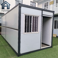 Maison conteneur pliable résistante aux intempéries, cabine modulaire en acier robuste pour la vie en extérieur par tous les temps, le travail et l'hébergement