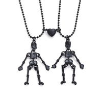 Collier de couple style Dark Wind, avec pendentif main fantôme et crâne lumineux pour Halloween