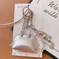 Sac à accessoires de créateur à suspendre, mini sac moderne en cuir PU, breloque de sac, petit sac coquille exquis de haute qualité, porte-clés de sac de luxe