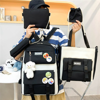 Nouveau Sac à Dos Tendance Grande Capacité Anti-Vol Fermeture à Bouton Style Japonais Décontracté Unisexe Quatre Pièces
