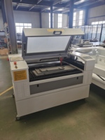 Machine de découpe laser CO2 à grande vitesse pour acrylique/plexiglas/bois/MDF/plastique 1060