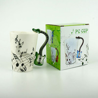 Tasse à café/lait en céramique créative en forme de guitare acoustique, bicolore, gaufrée, portable et durable, idéale pour le petit-déjeuner en famille - Offre Spéciale