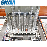 Chine nouvelle conception entièrement automatique eau minérale rotatif PET bouteille en plastique soufflage Machine de moulage par soufflage à grande vitesse