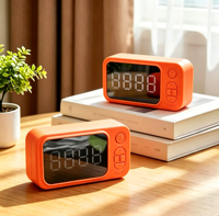 Réveil numérique LED miroir en gros d'usine avec haut-parleur 1200 mAh, prend en charge la carte TF, idéal pour chambre à coucher, hôtel, promotion d'entreprise, cadeau