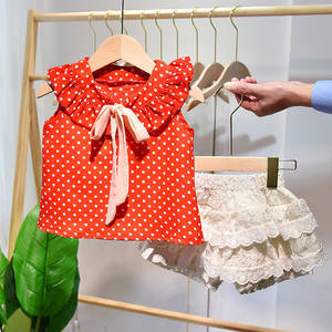 Distributeur Chine Usine Vêtements Enfants Ensembles Fille T-shirt à Pois Tangerine et Mini-jupe en Dentelle Très Courte - Product Image 1