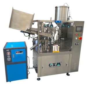 Machine de remplissage de tubes souples à air chaud électrique avec alimentation automatique des tubes pour crèmes chimiques, cosmétiques, dentifrices et onguents - Product Image 1