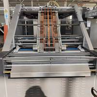 Machine à laminer semi-automatique pour boîtes en carton ondulé