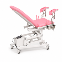 Table d'examen gynécologique électrique pliable, lit d'accouchement obstétrical avec supports de jambe réglables en hauteur et plateau à déchets