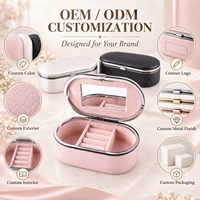 Boîte à bijoux ovale en cuir PU avec logo personnalisé, miroir, cadre en métal, organiseur de bijoux, doublure en velours doux, compartiments personnalisés pour bagues