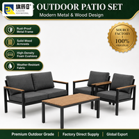 Ensemble de meubles de patio extérieur 4 pièces, structure en métal noir, plateau en bois, canapé deux places, 2 fauteuils, table basse, jardin
