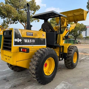 Chargeuse sur pneus KOMATSU WA510 Jaune 4x4, capacité de charge nominale de 15 tonnes, puissance de 92 kW, roulements et boîte de vitesses, équipement de construction - Product Image 1