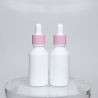 Bouchon rose avec 30ml 1oz Emballage cosmétique de luxe en or de haute qualité Bouteille en verre d'huile essentielle pour les yeux avec compte-gouttes