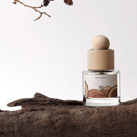 Vente en gros 50ml 100ml 150ml 200ml Bouteille vide de luxe ronde claire blanche de diffuseur de parfum en verre de roseau avec couvercles à vis
