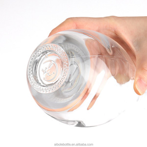 Bottiglia <span class=keywords><strong>di</strong></span> <span class=keywords><strong>Vetro</strong></span> per Brandy XO da 500ml/750ml a Forma <span class=keywords><strong>di</strong></span> Goccia d'Acqua con Superficie Ondulata Bianca Trasparente Sigillata con Tappo in Sughero per Vini e Distillati - Product Image 5