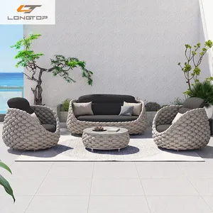 Yuvarlak yumurta sandalye Rattan otel avlu Modern açık kumaş mobilya halat bahçe su geçirmez sünger sehpa koltuk takımı