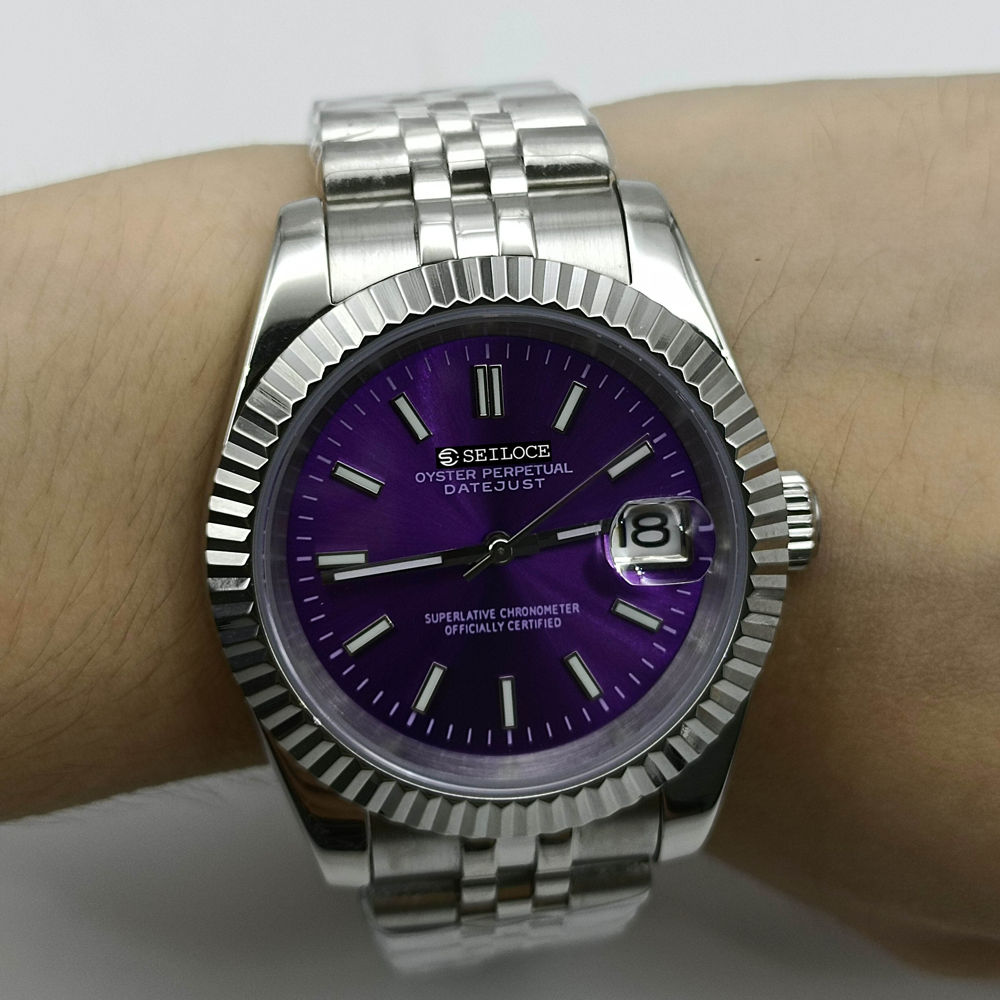 ตัวเรือนสีเงิน+หน้าปัดสีม่วง