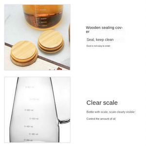 Pichet en <span class=keywords><strong>verre</strong></span> borosilicaté 1000ML <span class=keywords><strong>avec</strong></span> couvercle en bambou <span class=keywords><strong>Carafe</strong></span> à <span class=keywords><strong>eau</strong></span> ronde ambre <span class=keywords><strong>avec</strong></span> poignée et bec pour boisson à l'huile maison - Product Image 4